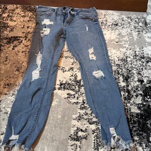 EXPRESS. Women’s, ripped, light blue jeans. Good condition.